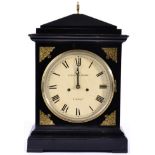 An Ebonised Striking Table Clock, circa 1820, caddy pediment, pierced sound frets, 8-inch painted