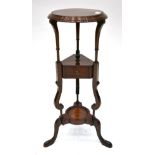 A George III Style Mahogany Washstand, late 19th century, the circular moulded top with later