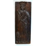 A Carved Oak Panel, late 16th/early 17th century, carved in relief with St Mark, a lion at his feet,