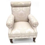 A Victorian Upholstered Armchair, circa 1870, recovered in cream floral fabric, with rounded arms