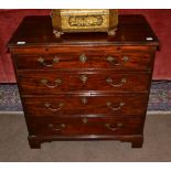 A Mahogany Bachelor's Chest, the moulded top above a pull-out brushing slide and four graduated long