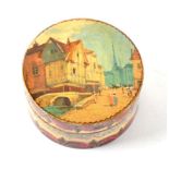An Ivory and Vernis Martin Circular Box and Cover, mid 19th century, painted with landscapes, 5cm