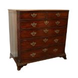 A George III Mahogany Straight Front Chest of Drawers, late 18th century, the crossbanded top with