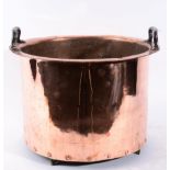 A Copper Log Bin, late 19th century, of cylindrical form with everted rim and loop handles, 47cm