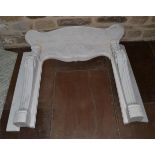 A Louis IV Style Carved White Marble Chimney piece, modern, with serpentine shaped mantel shelf,