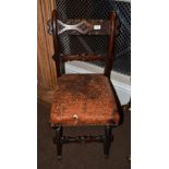 An Early Victorian Gothic Revival Dining Chair, the carved top rail and horizontal splat above