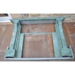 A Green Marble Fire Surround, the rectangular top on fluted capitals and square columns, 144cm wide