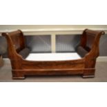 A Mid 19th Century French Mahogany Single Bedstead, of sleigh form with scrolled end supports and