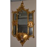 A French Gilt and Gesso Mirror, in Louis XV style, the moulded frame with acanthus scrolls, the