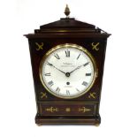 A Regency Style Brass Inlaid Mantel Timepiece, caddied pediment, ringed side carrying handles, 6-