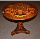 A 19th Century Dutch Mahogany and Marquetry Inlaid Circular Flip-Top Table, richly inlaid with