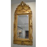 A Carved Giltwood and Gesso Mirror, 2nd quarter 19th century, the mercury plate in two sections