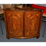 A 19th Century Dutch Mahogany and Marquetry Inlaid Bowfront Free-Standing Corner Cupboard, the top