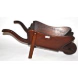 A Child's Mahogany Wheelbarrow, mid 19th century, with ogee rim and curved handles, initialled