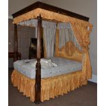 A Mahogany 5ft Canopy Bed, 19th century in part, the moulded canopy with an orange floral silk