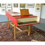 A Red Painted Harpsichord by Colin Booth, dated 1976, the hinged lid enclosing a cream and parcel