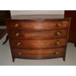 A Mahogany Bowfront Chest of Drawers, early 19th century, the reeded edge above four graduated