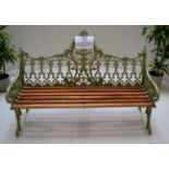 A Green Painted Coalbrookdale Style Garden Bench, cast with a shield within gothic tracery and