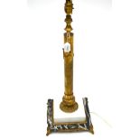 A Brass Table Lamp, in neo-classical style, as a fluted column on a stepped white and grey marble