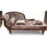 A Victorian Mahogany Chaise Longue, mid 19th century, recovered in plush velvet, the acanthus carved