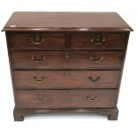 A George III Mahogany Straight Front Chest of Drawers, early 19th century, the moulded top above two