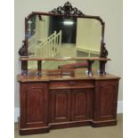 A Victorian Mahogany Inverted Breakfront Mirror-Back Sideboard, 3rd quarter 19th century, the carved