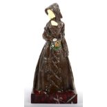 E Meier: A Bronze and Ivory Figure of a Girl, holding an enamel decorated bouquet of flowers, on a