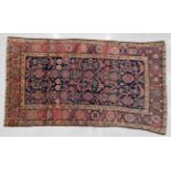 Kurdish Khelleh Carpet Iranian Kurdistan, early 20th century The indigo lattice field enclosed by