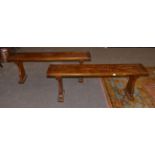 A Set of Four Late Victorian Benches, the tops of plank construction with cleated ends, on shaped