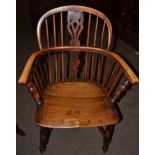 A Mid 19th Century Yewwood Windsor Armchair, the double spindle back support with pierced splat