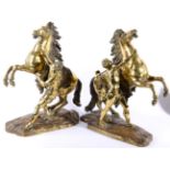 After Guillaume Coustou (1677-1746): A Pair of Gilt Bronze Marly Horses and Attendants, on mound