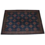 Large European Carpet of Ushak Design probably Donegal, circa 1910 The deep indigo field with