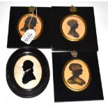 George Atkinson (fl.c.1806-1826): A Pair of Silhouettes of a Lady and Gentleman, in profile, oval,