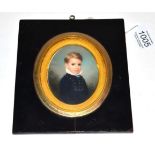 George Hargreaves (1797-1870): A Miniature Bust Portrait of John Gladstone Larkins, as a boy, signed