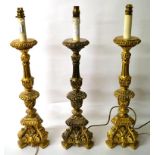 A Set of Three Italian Porcelain and Gesso Candle Stands, in Renaissance style, with fluted