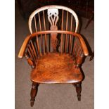A Mid 19th Century Yewwood Windsor Armchair, the double spindle back and pierced splat above an