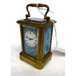 A Small Brass and Enamel Carriage Timepiece, circa 1900, carrying handle, light blue floral