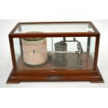 A Barograph, early 20th century, in a glazed mahogany case, 35cm wide overall