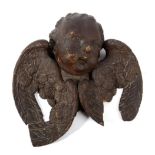 A Carved Wood Winged Cherub Mask, 17th century, 42cm wide