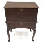 An 18th Century Oak Box on Stand, the hinged lid above a moulded base with single frieze drawer