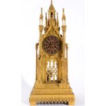 A Gothic Style Cathedral Form Striking Gilt Metal Mantel Clock, circa 1840, cathedral form case in