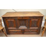 An 18th Century Joined Oak Chest, carved with the initials ER and dated 1739, the adapted hinged lid