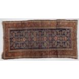 Kurdish Rug North West Iran, circa 1920 The indigo Herati field enclosed by stylised floral borders,