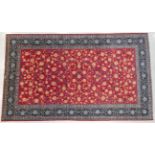 Large Isfahan Carpet Central Iran, circa 1970 The crimson field with an allover design of vines