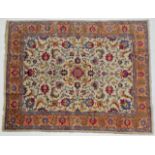 Tabriz Carpet Iranian Azerbaijan, 20th century The ivory field of acanthus vines centred by a