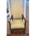 A Carved Walnut Open Armchair, late 19th century, in 17th century style, recovered in yellow and