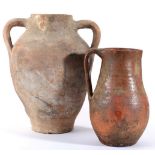 A Terracotta Twin-Handled Jar, in Ancient Roman style, of baluster form, 36cm high; and A Similar