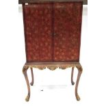 A George I Style Walnut and Parcel Gilt Cocktail Cabinet, modern, the upper section decorated with