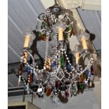 A Cut Glass Six-Branch Chandelier, with scrolled arm supports and multicoloured cut glass