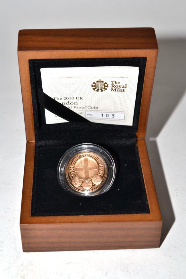 Elizabeth II (1952-), proof £1 struck in gold, 2010 London badge (950 issued), in Royal Mint box and